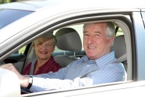 Elderly Couple Driving